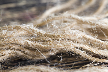 Image showing broken and untangled thick linen rope