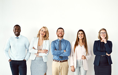 Image showing Law portrait, smile and teamwork of business people by white wall background mockup in workplace. Face, confident group and lawyers standing together with arms crossed, diversity and collaboration.