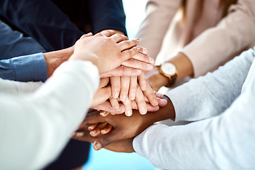 Image showing Team building, support or hands of business people in huddle for, partnership, support or community mission. Trust, motivation or closeup of corporate group of workers with goals or target in meeting