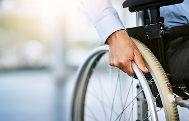 Image showing Wheelchair, disability and man hand holding wheel in a hospital for healthcare. Disabled, mobility problem and male person in a clinic for support and medical care with hands of patient and mockup