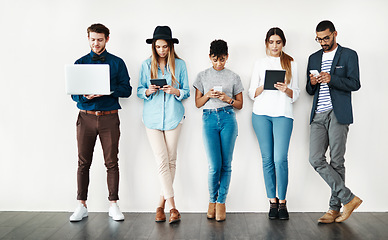 Image showing Diversity, connection and people on social media, online networking or digital communication on technology. Group, wireless connectivity and talking on phone, laptop or tablet and mockup background