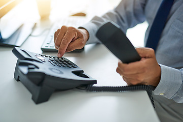 Image showing Hand, telephone and business man dial a number at work or on desk or call centre for customer service and In the office. Employee, telemarketing and receptionist or consulting and communication