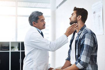 Image showing Healthcare, consultation and doctor checking neck of patient with advice, help and examination. Medicine, health care and Indian man with throat pain in doctors office consulting medical professional