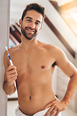 Image showing Toothbrush, portrait and shirtless man brushing teeth in home for dental wellness, healthy smile, body or mouth care. Happy male in bathroom for oral cleaning, fresh breath and hygiene in the morning