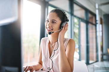 Image showing Happy woman, call center and consulting with headphones in customer service, support or telemarketing at office. Friendly female person or consultant agent with smile and headset for online advice
