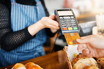 Image showing Credit card payment, bakery and hands with a machine at a restaurant for a service or food. Cafe, pay and a customer paying or buying a product at a coffee shop with a transaction from a worker