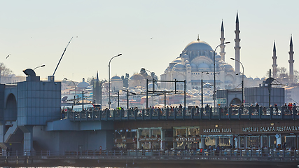 Image showing Istanbul, Turkey - April 1, 2017: The Galata bridge with fishermen