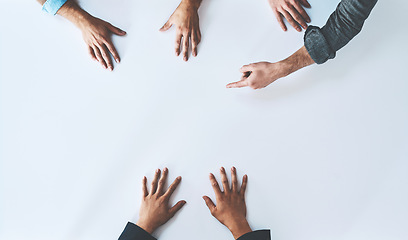 Image showing Mockup, pointing and lawyer team planning law strategy or court case together for teamwork or collaboration. Brainstorming, discussion and hands of corporate people in a meeting for evidence review