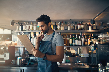 Image showing Man in restaurant, checklist on clipboard and inventory check, small business and entrepreneur in hospitality industry. Male owner reading list, think and cafe franchise with admin and stock taking