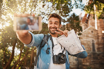 Image showing Tourist, happy man and peace sign selfie outdoor in a city for travel holiday with memory, smile and happiness. Male person with hand emoji for adventure, journey or vacation photo and freedom