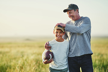 Image showing Father, kid portrait and rugby play in countryside field for bonding and fun in nature. Mockup, dad and young child together with happiness and smile ready for sports and kids game outdoor on farm