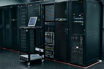 Image showing Server room, empty or laptop for internet connection, cloud computing network or cyber security hardware. IT support background, information technology or cord on machine equipment in a data center