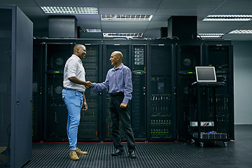 Image showing Handshake, partnership or men in server room of data center worker with a thank you hand shake for help. B2b deal agreement, shaking hands or people in collaboration for network glitch or IT support