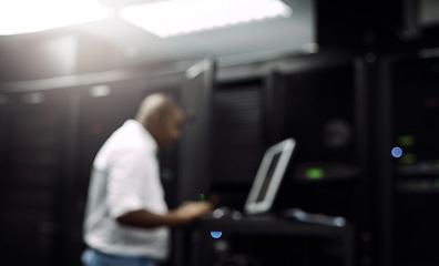 Image showing Code, black man or coding on computer in server room for big data, tech glitch or digital website. IT support, blurry or technician typing on laptop testing UX, programming or software development