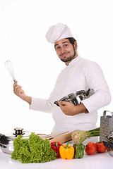 Image showing young chef preparing lunch 