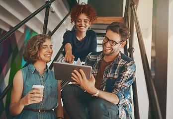 Image showing Teamwork, designers talking or happy people with tablet or online report in meeting for data analysis on steps. Research, digital project or creative employees in group discussion in modern office