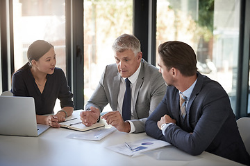 Image showing Meeting, collaboration and workshop with a manager and team in the boardroom for a coaching seminar. Teamwork, strategy and planning with a mature CEO business man talking to his staff in the office