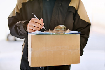 Image showing Delivery man, box and hands with a package and pen for signature on paper at front door. Logistics worker with a courier company parcel in cardboard for e commerce shipping or mail distribution