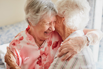 Image showing Happy, hug and senior woman friends laughing in the bedroom of a retirement home together. Smile, reunion and laughter with an elderly female pensioner and friend bonding indoor during a visit