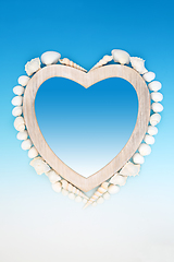 Image showing Beautiful Seashell Heart Shape Wooden Frame 