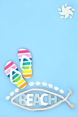 Image showing Summer Beach Vacation with Rainbow Flip Flops