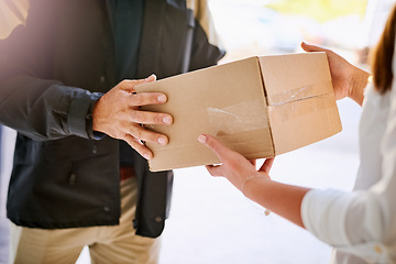 Image showing Customer, box and hands of delivery man giving courier company package at home. Logistics worker at front door of woman or client with a cardboard parcel for e commerce shipping or mail distribution