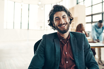 Image showing Portrait, startup and happy man in office, start up business project and entrepreneur at design agency. Young boss with smile on face, businessman or professional leader in chair at startup company.