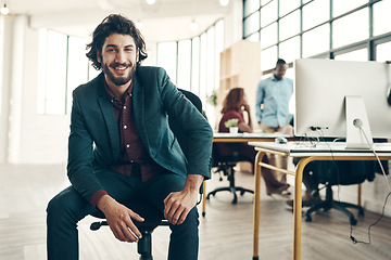 Image showing Portrait, startup and office, happy man in chair and creative business project for entrepreneur at design agency. Boss, smile and happiness, successful young businessman or ceo in start up workspace