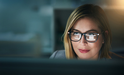 Image showing Glasses, serious and business woman at night on a computer or working late or editor for a project deadline and in an office. Research, email and overtime or corporate worker or analysis and on pc