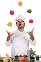 Image showing chef juggling with peppers 