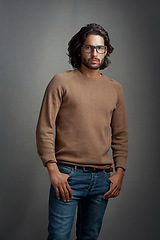 Image showing Glasses, portrait and serious man in studio isolated on a gray background. Face, spectacles and handsome male person from Brazil with eyewear or frames for fashion, stylish and aesthetic mockup.