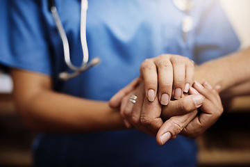 Image showing Closeup, doctor holding hands with senior woman and cancer care or support. Healthcare or trust, empathy or compassion and female caregiver or nurse holding elderly person hand for hope and kindness