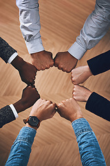 Image showing Team building, fist bump or hands of business people for support, diversity or community group in office. Teamwork, above or circle of fists for motivation, collaboration or partnership for a mission