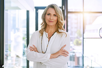 Image showing Crossed arms, office and portrait of business woman with confidence, empowerment and career pride. Corporate, management and face of senior female worker with future vision, mission and motivation