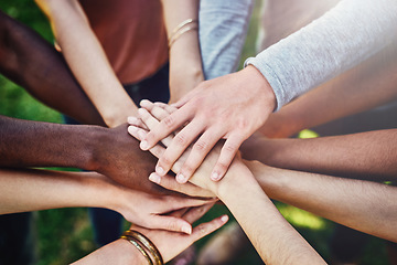 Image showing Teamwork, hands and above friends outdoor for partnership, collaboration and goal motivation. Team building, top view and person with fingers in support of mission, strategy and community with trust