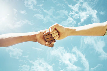 Image showing Fist bump, people and blue sky with motivation, success and teamwork outdoor. Support, friends and winning hand sign in summer with celebration and agreement showing solidarity in nature from victory