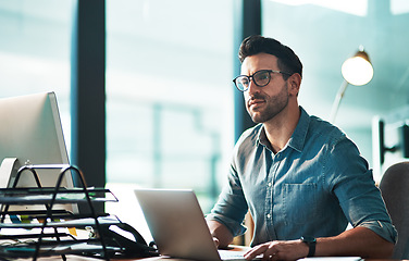 Image showing Business man, thinking and laptop in office for innovation on technology in startup company. Male employee daydream at computer for inspiration, future ideas and planning goals of vision in mindset