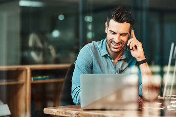 Image showing Happy man talking with phone at laptop in office, conversation and communication for online planning. Male worker, cellphone contact and call at computer for mobile networking in startup business