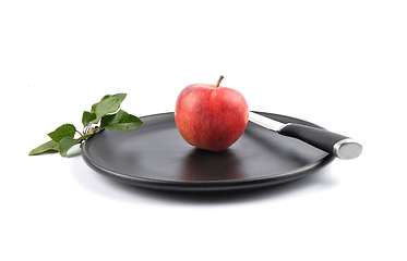 Image showing Apple on plate and white