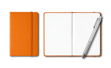 Image showing Orange closed and open notebooks with a pen isolated on white