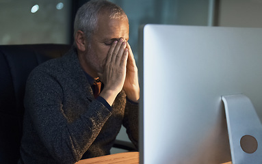 Image showing Office, night and stress headache by senior man on computer with problem crisis or internet glitch. Migraine, burnout and frustrated elderly male person working late on deadline, 404 or business fail