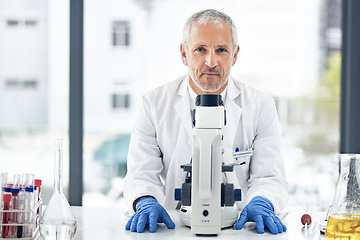 Image showing Man, microscope and portrait of scientist in science research, breakthrough or discovery at the laboratory. Senior male doctor, medical or healthcare professional in scientific chemistry at the lab