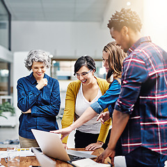 Image showing Laptop, diversity and designer team laughing at meme on social media or planning collaboration together at a startup. internet, strategy and small business group of employees streaming joke on news