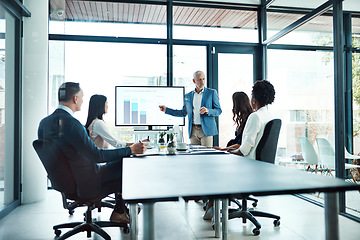 Image showing Corporate training, team and man with presentation, leader or graph for financial growth, budget or charts. Male person, employee or accountant with group, staff or coworkers in a meeting and talking