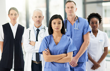 Image showing Healthcare, team and portrait of doctors with nurses in hospital with arms crossed for leadership or support. Diversity, mindset and proud face of medical group in solidarity or service collaboration