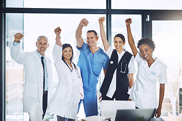 Image showing Doctor, team and celebration in healthcare for winning, success or achievement together at the hospital. Group portrait of happy doctors in joy for medical win, victory or teamwork at the clinic