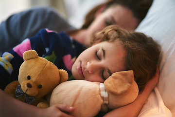 Image showing Young girl, mother and sleeping with teddy bear in bed with love and bonding. Kid, mom and dream together in the morning with daughter and mama in a family home feeling relax, calm and rest in house