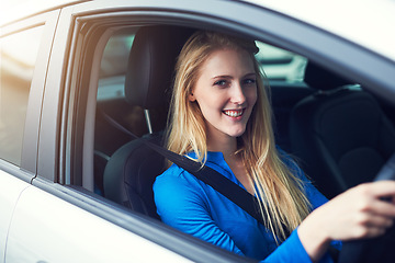 Image showing Portrait, smile and woman driving car for travel, journey and transportation. Face, happy and female person in vehicle, automobile and motor transport driver for traveling, road trip drive and moving