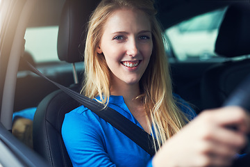 Image showing Happy, portrait and woman driving car for travel, journey and transportation. Face, smile and female person in vehicle, automobile and motor transport driver for traveling, road trip drive and moving