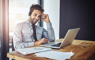 Image showing Happy businessman, laptop and call center in customer support or financial advice at the office. Friendly man person, consultant or agent talking on headset for online consulting service at workplace